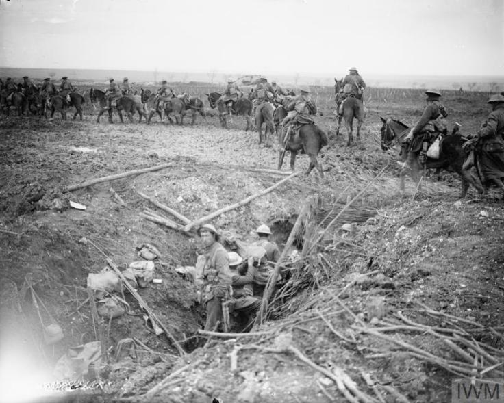 Cavalry moving forward past a trench held by British infantry near Monchy-le-Preux, 13 April 1917.